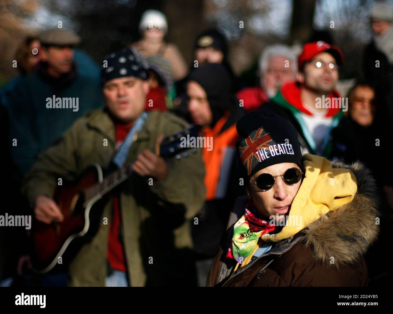 John Lennon fans gather at the Strawberry Fields memorial mosaic in