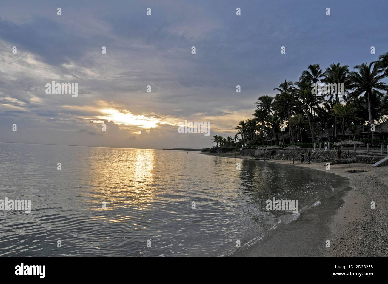 At dusk over a beach on the south coast of Viti Levu, the largest island in Fiji in the South Pacific. Stock Photo