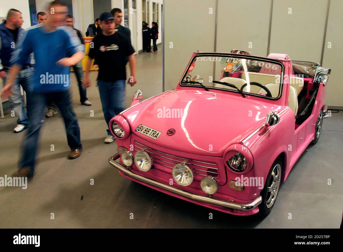 Visitors watch a tuned up Trabant car during a tuning show in Bucharest  March 29, 2007. REUTERS/Mihai Barbu (ROMANIA Stock Photo - Alamy