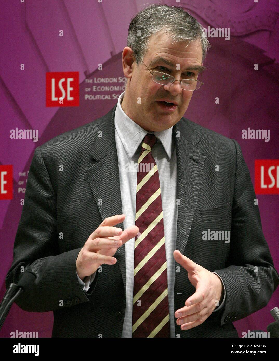 Deputy Governor of the Bank of England John Gieve delivers his speech at the London School of Economics in London February 19, 2009. Policy makers need to back their judgements with pre-emptive action, Gieve said on Thursday in a speech reflecting on the lessons of the financial crisis.     REUTERS/Andrew Parsons    (BRITAIN) Stock Photo