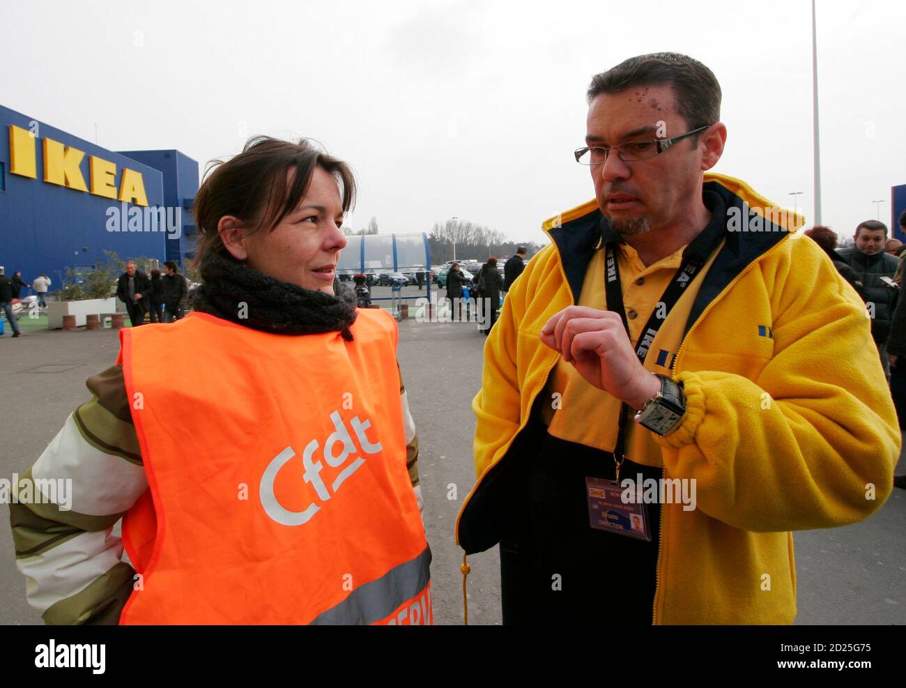 An union member (L), employee of Swedish retailer IKEA, argues with local  manager (R) during a demonstration demanding salary increases outside a Ikea  store in Bordeaux, southwestern France, February 13, 2010. REUTERS/Olivier