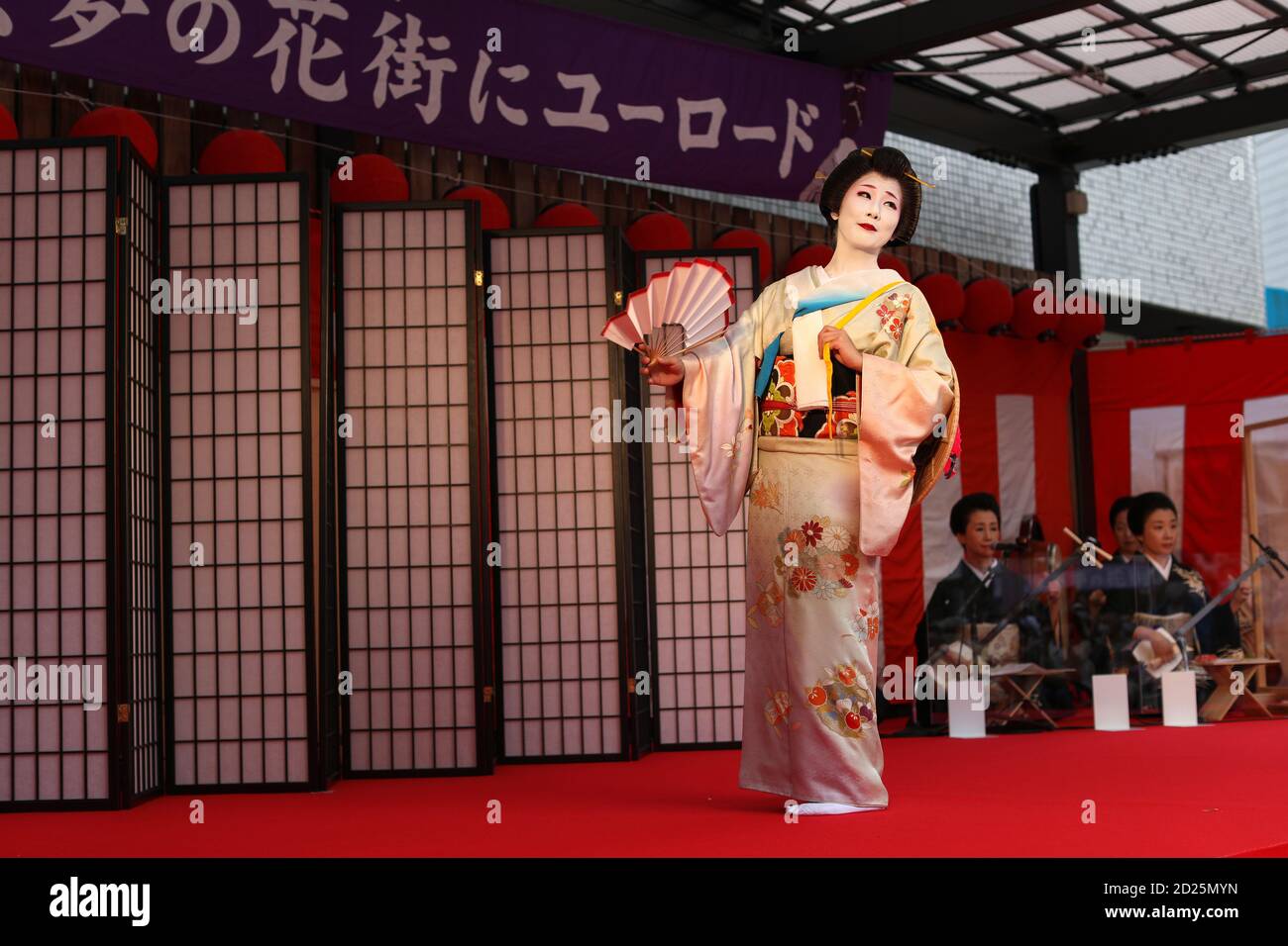 Hachioji, Japan. 03rd Oct, 2020. A Geisha seen dancing during their first performance on public stage after quarantine.Hachioji city has just a few Okiya houses (houses where Geishas live and learn their art). Geichas made their first performance on the public stage on 3th October after quarantine. Musician entertainers were separated from each other by a plastic screen as a precaution measure against Covid-19. Credit: SOPA Images Limited/Alamy Live News Stock Photo