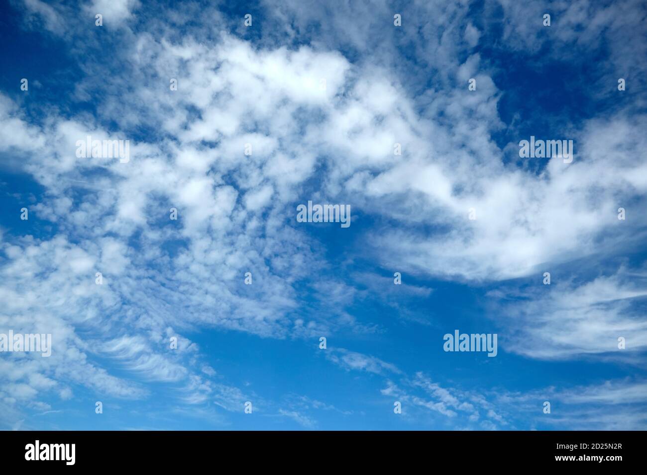 amazing white fluffy clouds on blue sky background Stock Photo