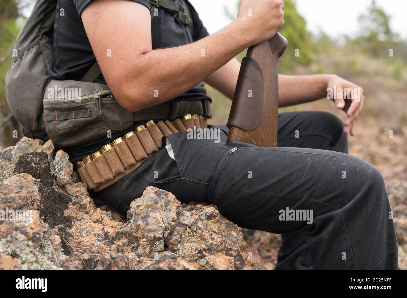 Close up view of an unrecognizable hunter with a shotgun. High quality photo Stock Photo