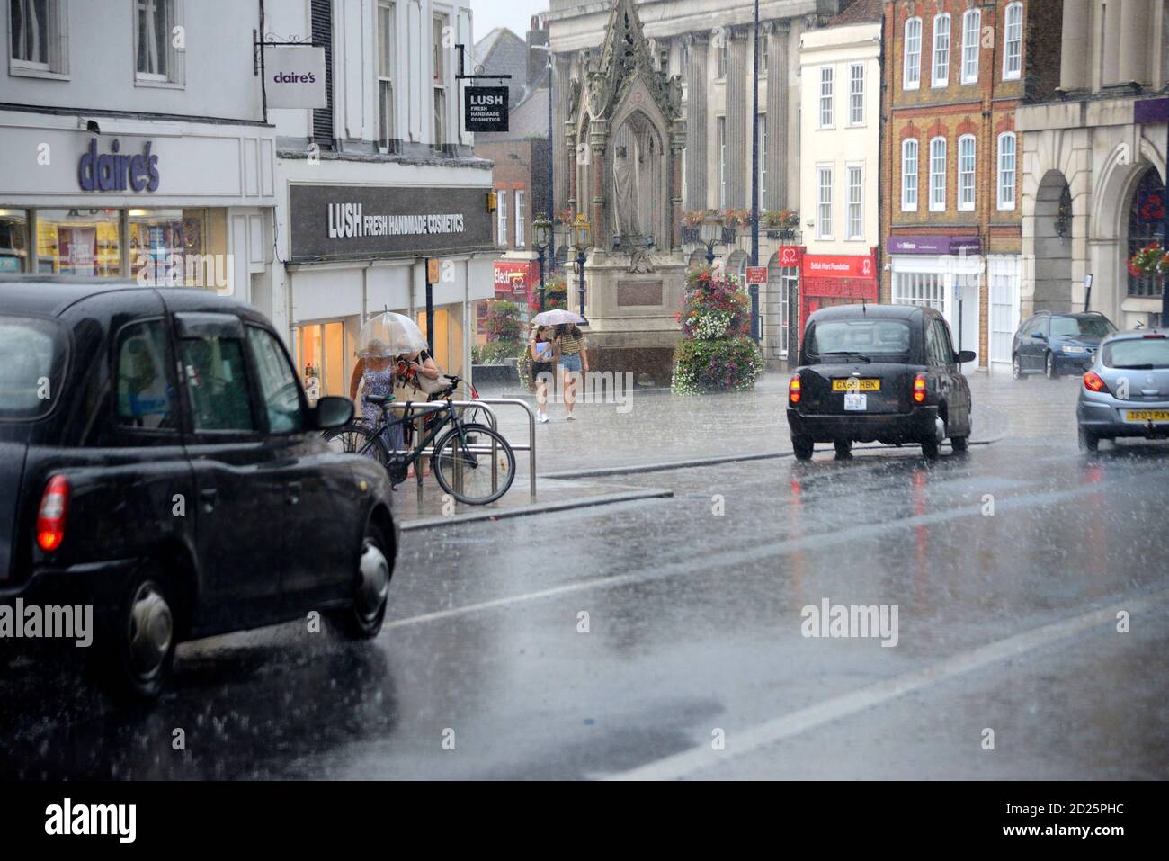 Maidstone, Kent, UK. The High Street seen from King Street during a heavy rain storm, August 2020 Stock Photo