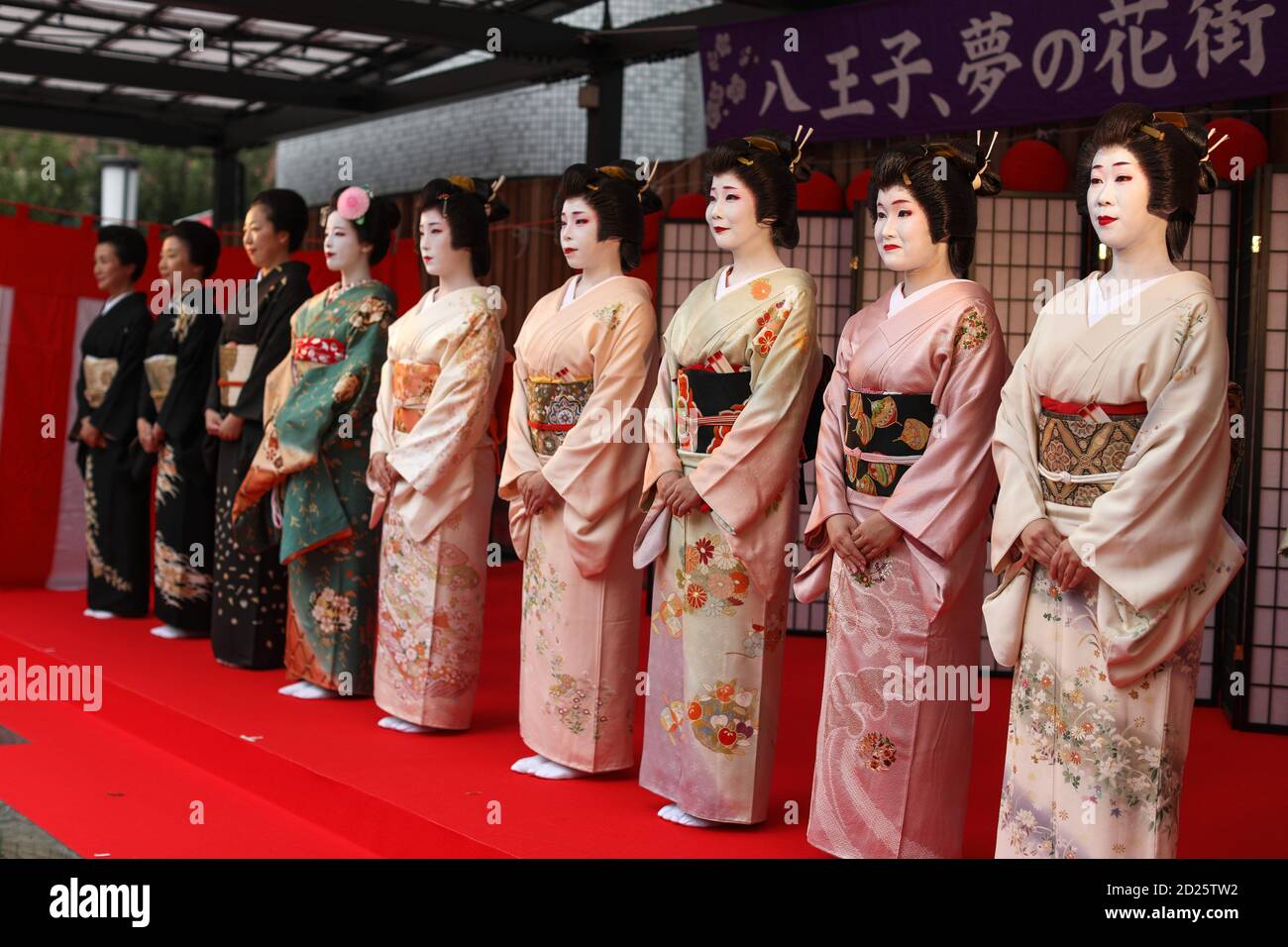 Hachioji, Tokyo, Japan. 3rd Oct, 2020. Geaisha standing on the stage after performance.Hachioji city has just a few Okiya houses (houses where Geishas live and learn their art). Geichas made their first performance on the public stage on 3th October after quarantine. Musician entertainers were separated from each other by a plastic screen as a precaution measure against Covid-19. Credit: Marina Takimoto/SOPA Images/ZUMA Wire/Alamy Live News Stock Photo