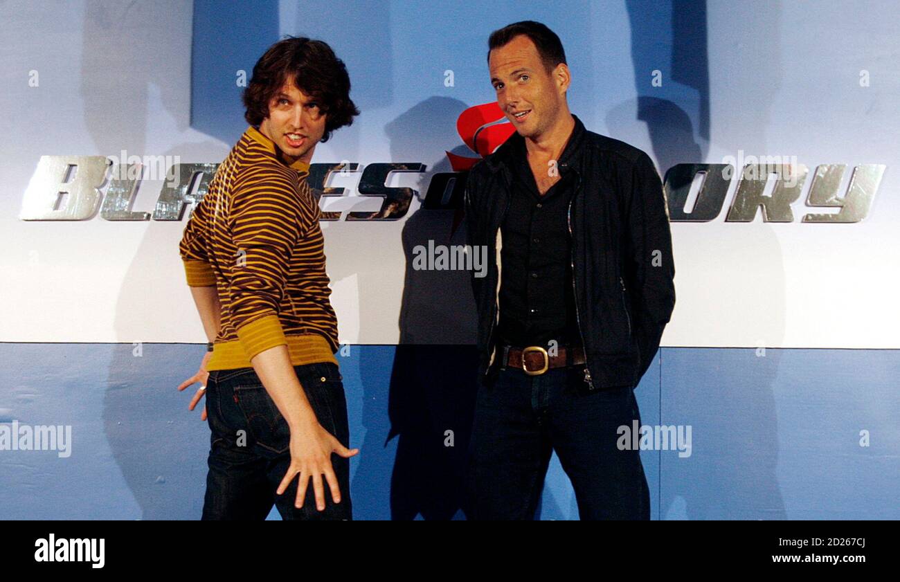 Actors Jon Heder (L) and Will Arnett pose for photographers during a media opportunity at an ice skating rink to promote their film "Blades of Glory" in Sydney June 6, 2007.         REUTERS/Tim Wimborne     (AUSTRALIA) Stock Photo