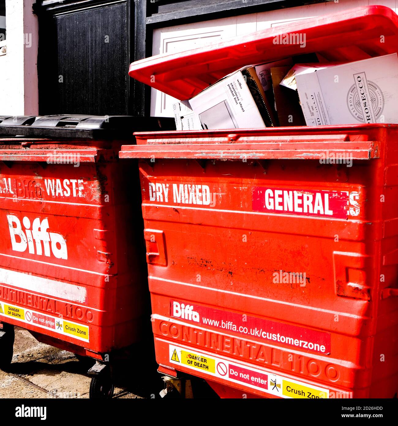 https://c8.alamy.com/comp/2D26HDD/london-uk-october-06-2020-biffa-commercial-waste-bin-billed-with-recycled-cardboard-waste-2D26HDD.jpg