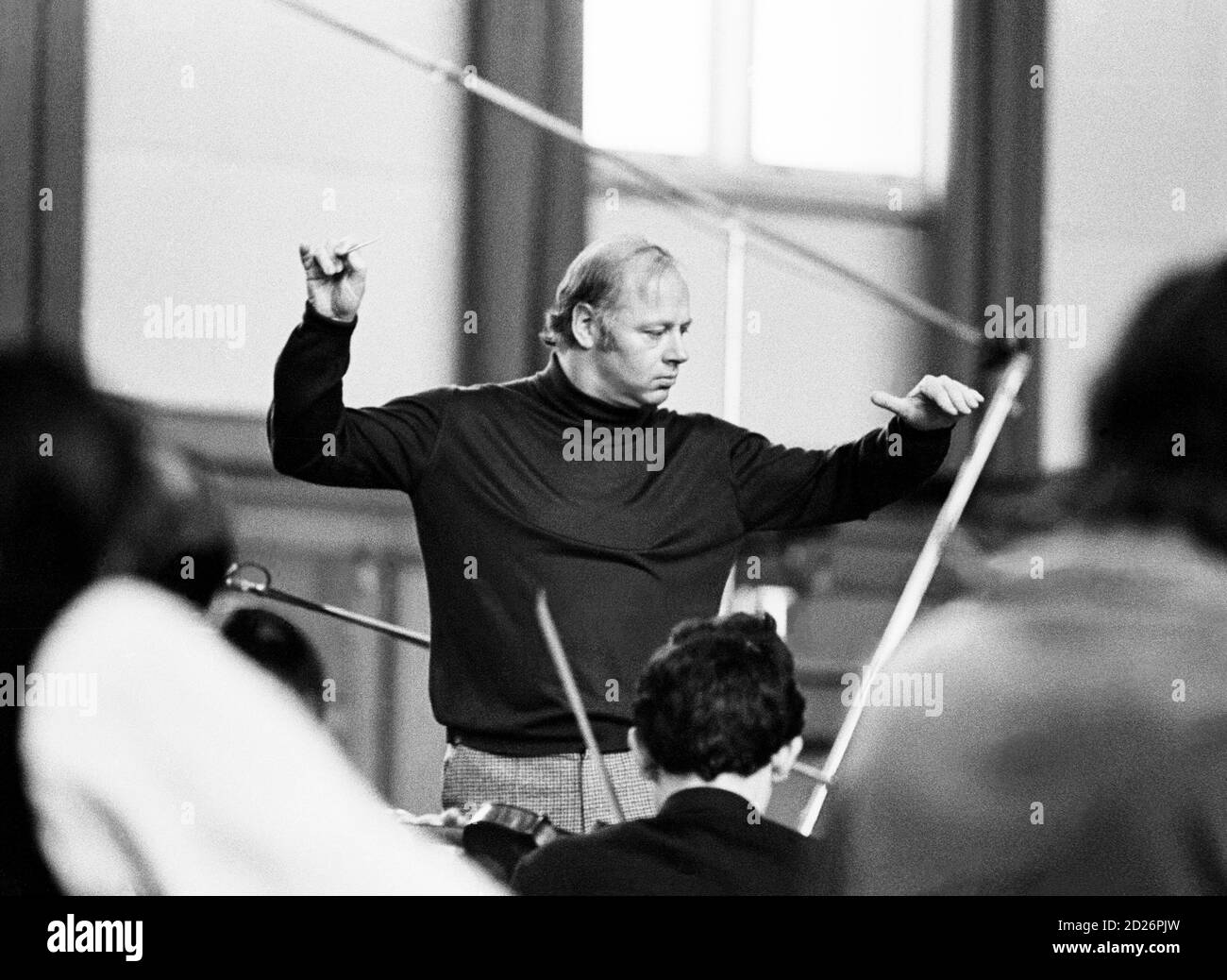 Bernard Haitink conducting a Philips recording session of the Liszt piano concertos with the London Philharmonic Orchestra (LPO) in the Assembly Hall at Walthamstow Town Hall, Walthamstow, London in May 1972 Stock Photo