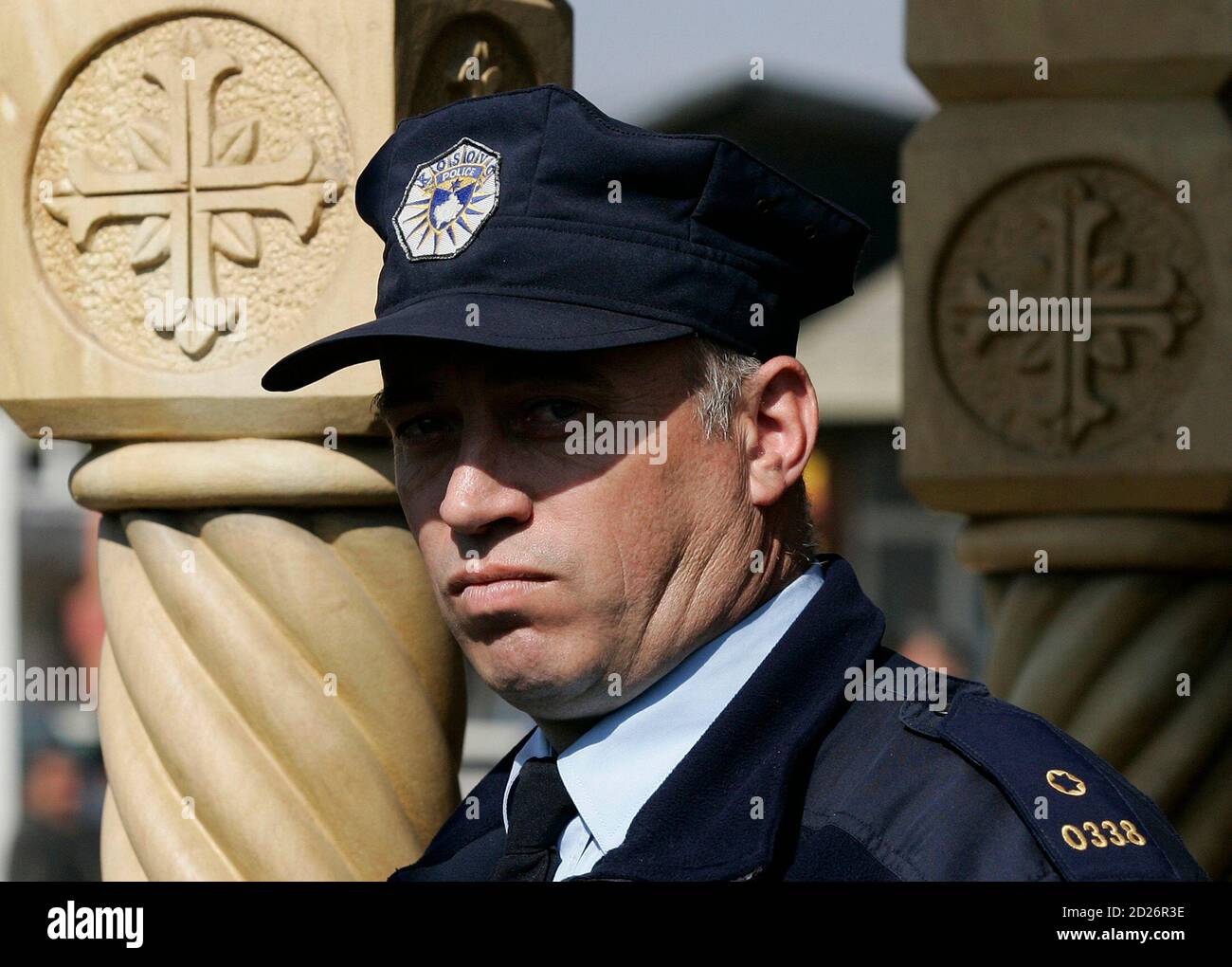 A Serbian police officer protests in the monastery village of Gracanica,  Kosovo February 29, 2008. Several hundred Kosovo Serb officers have  deserted the Kosovo police force since the new state declared independence