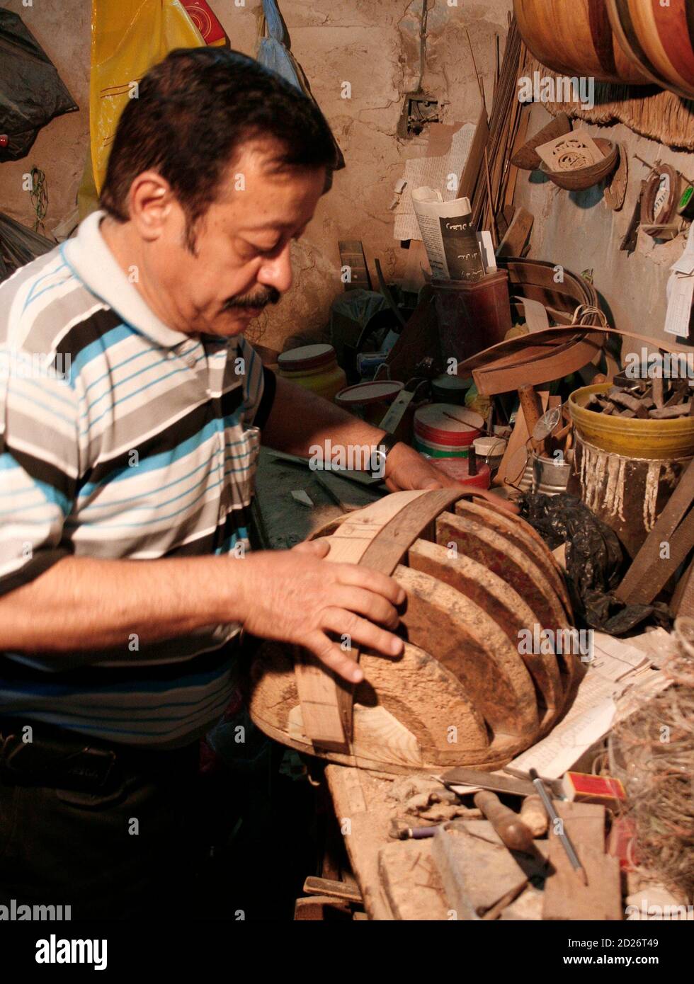 Maker of stringed instruments hires stock photography and images Alamy