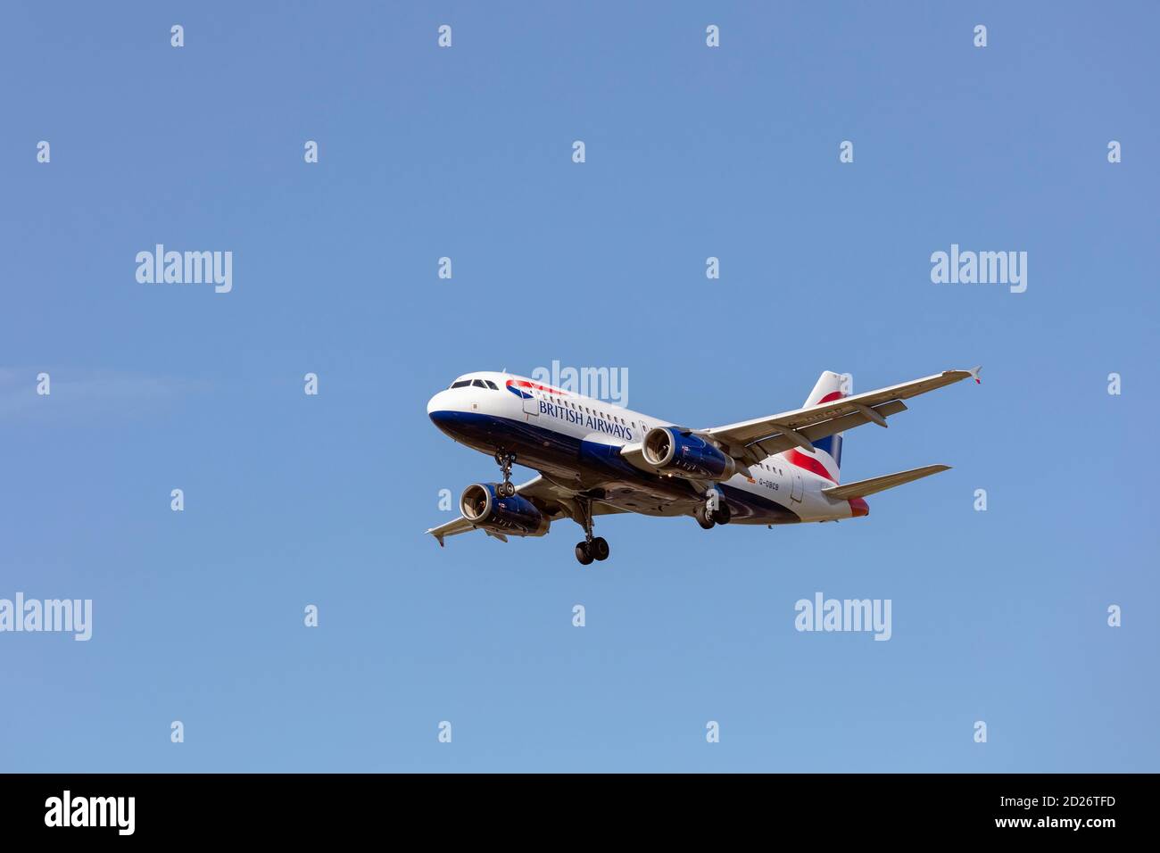 British Airways Airbus A319-100 with landing gear down. Stock Photo