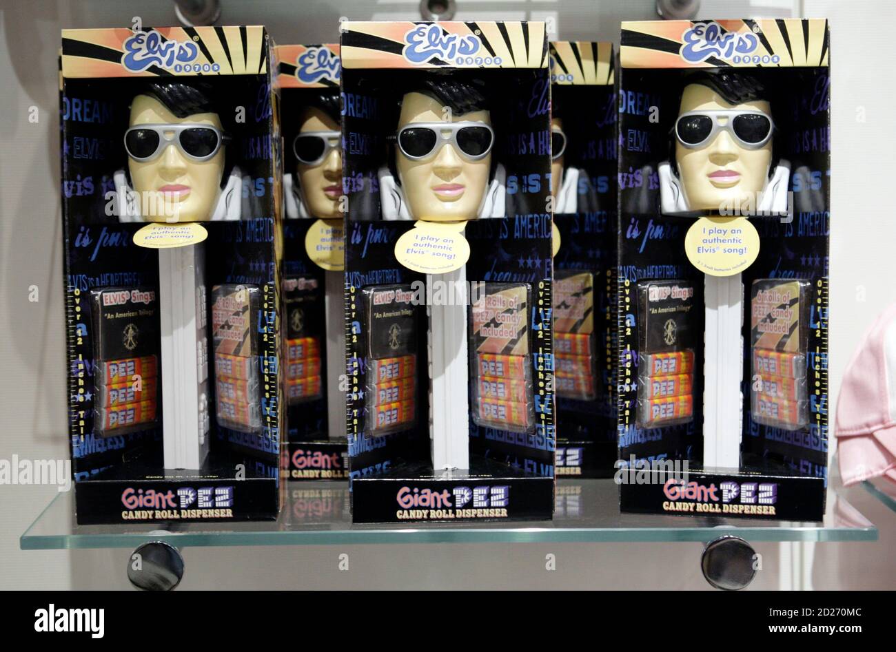 Elvis Presley giant PEZ candy dispensers are displayed at the official Viva ELVIS store at the Aria hotel-casino in Las Vegas, Nevada, December 15, 2009. Preview performances for the new show by Cirque du Soleil will begin Friday, December 18. Aria, the centerpiece of the $8.5 billion project, will open after a fireworks display Wednesday night. The development is a partnership between MGM Mirage and Dubai World. REUTERS/Las Vegas Sun/Steve Marcus (UNITED STATES - Tags: BUSINESS ENTERTAINMENT) Stock Photo
