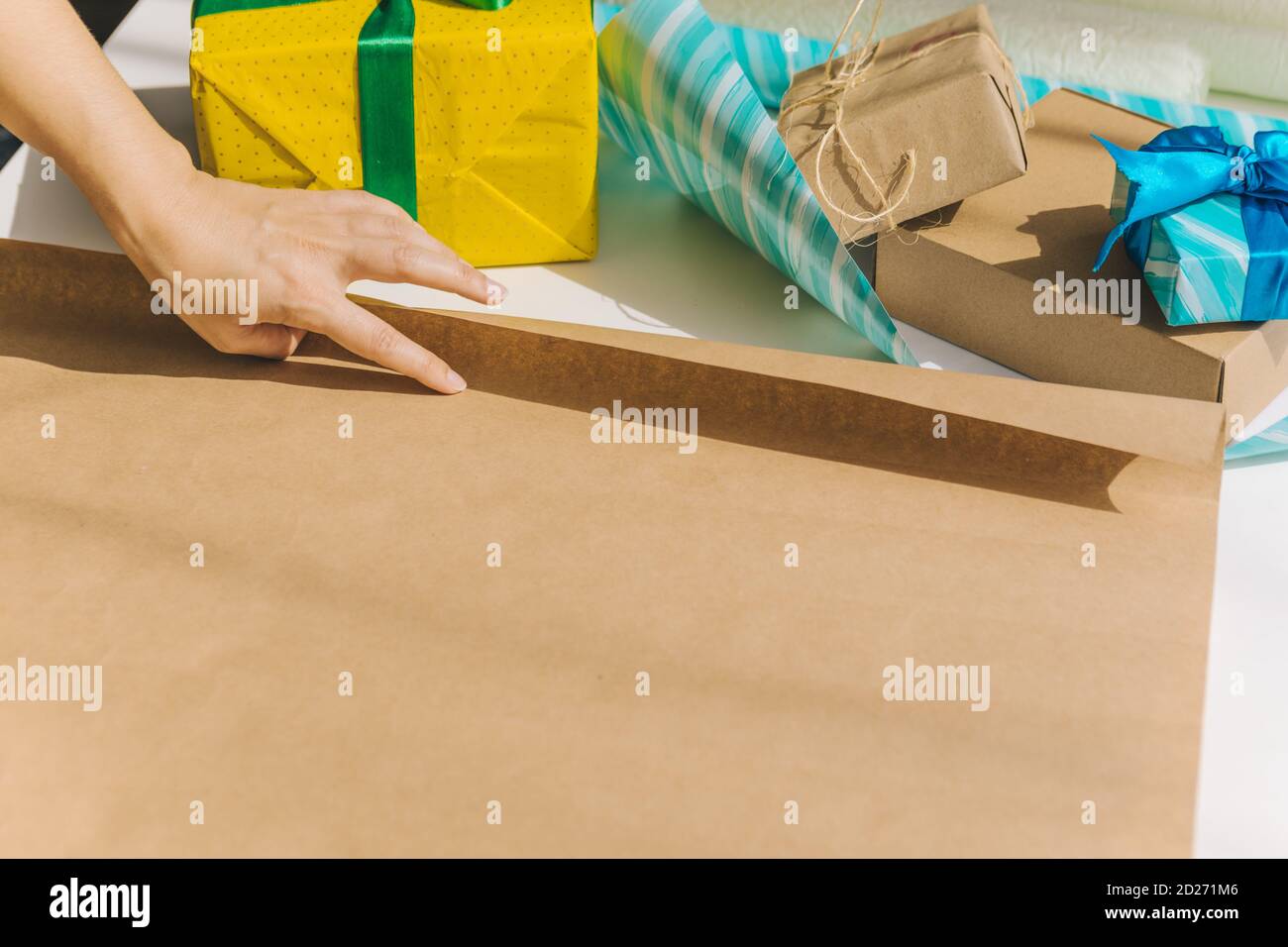 packing gift box with wrapping paper Stock Photo Alamy