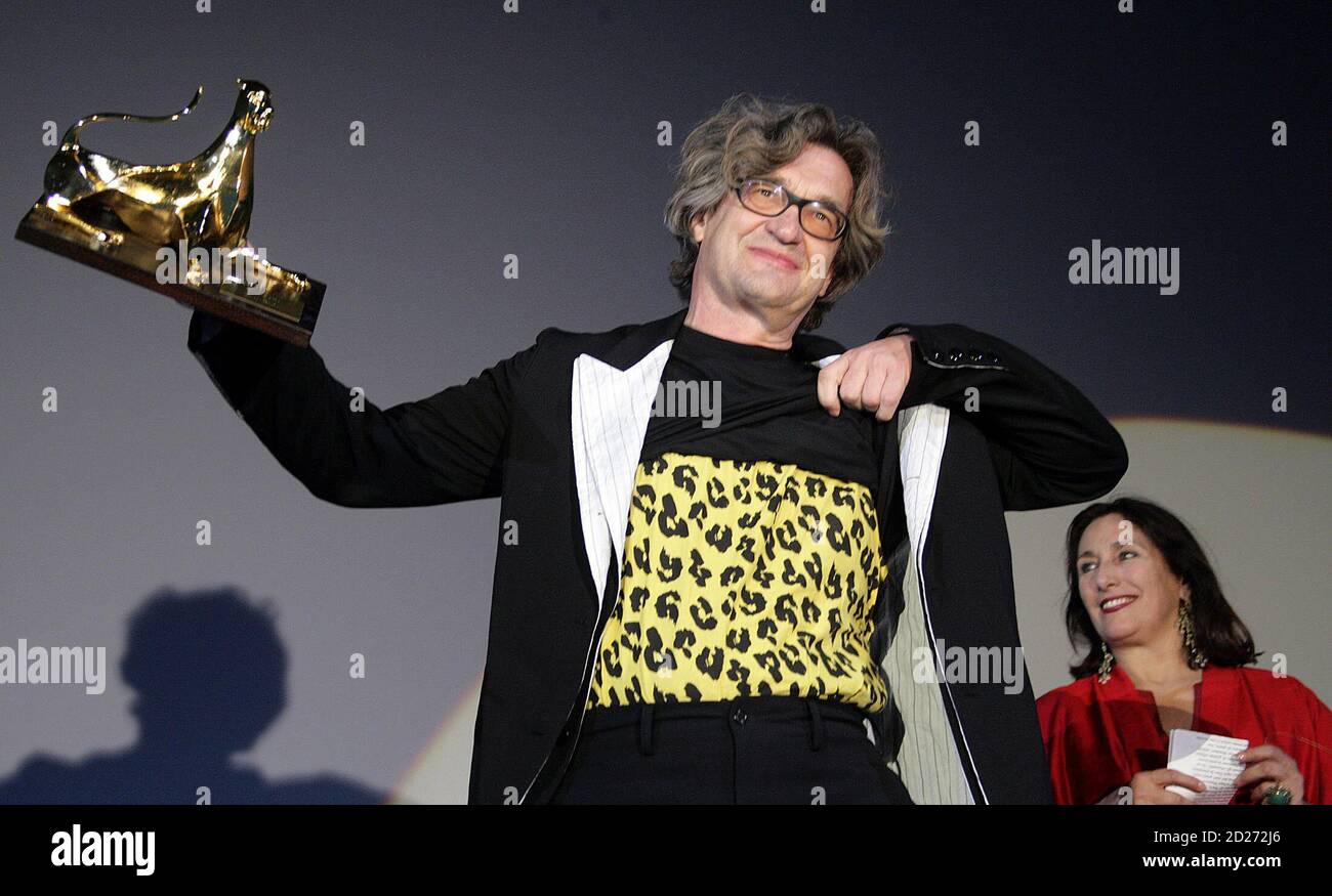 German director Wim Wenders shows off Leopard of Honour he received at  Locarno Filmfestival in Locarno. German director Wim Wenders shows off the  Leopard of Honour he received at the Locarno Filmfestival