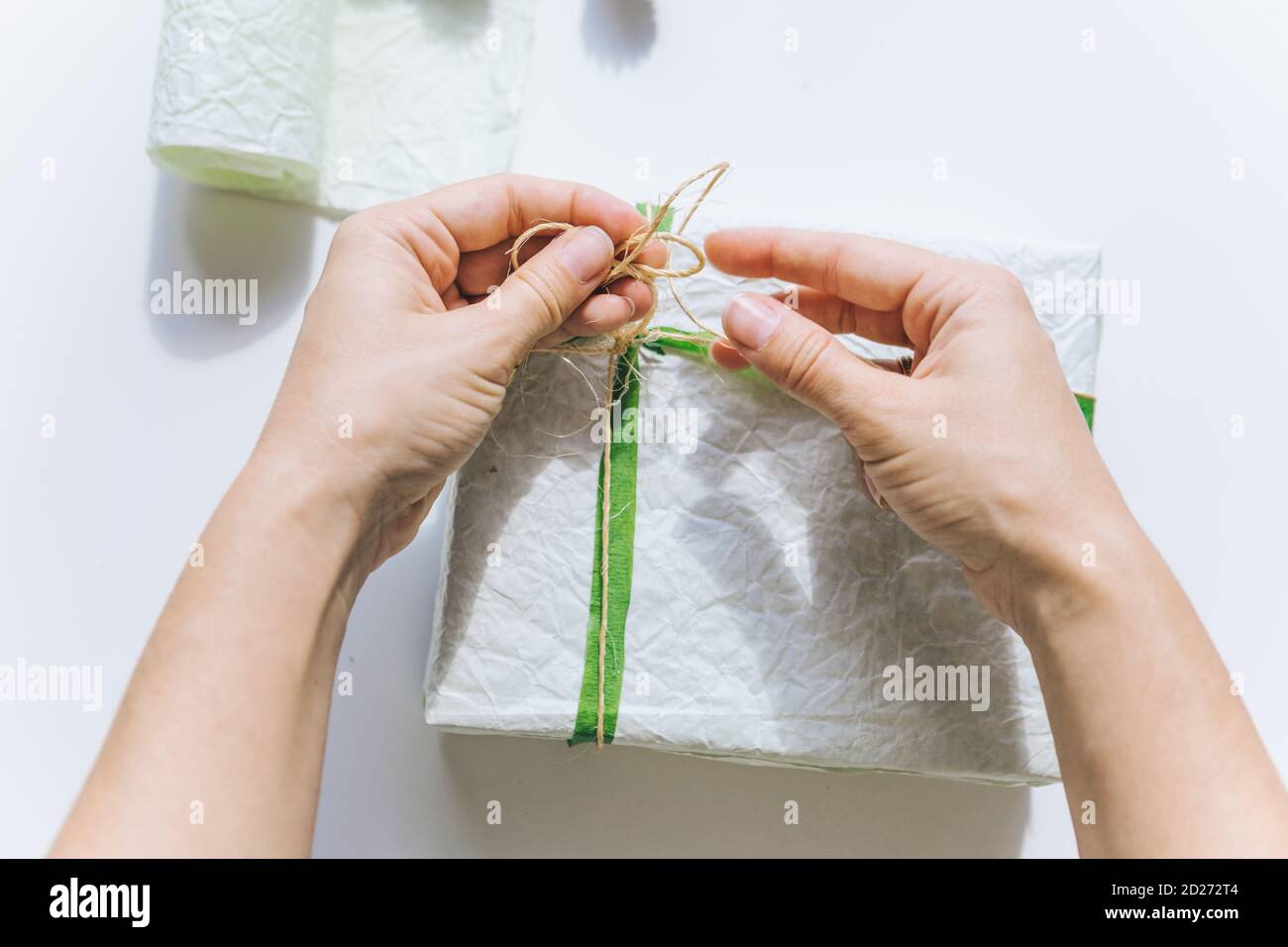 packing gift box with wrapping paper Stock Photo Alamy