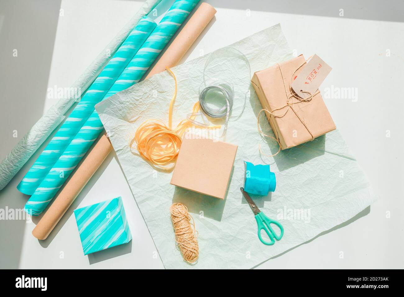 packing gift box with wrapping paper Stock Photo Alamy