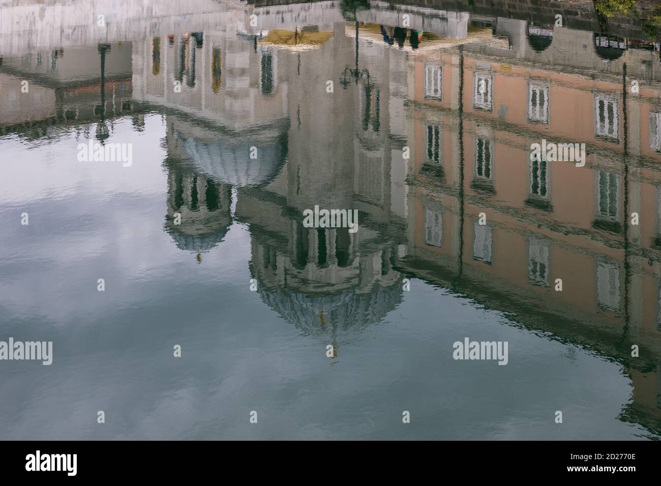Reflections of buildings (Serbian Orthodox church of Saint Spyridon) in the Grand Canal, Trieste, Friuli Venezia Giulia, Italy Stock Photo