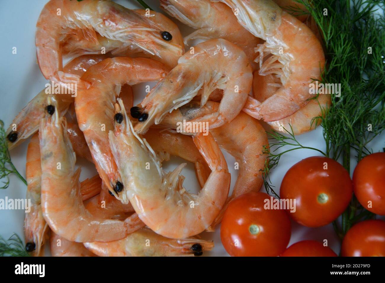 Prawns (Latin. Caridea) - recipes of culinary dishes with shrimp are popular in many countries Stock Photo