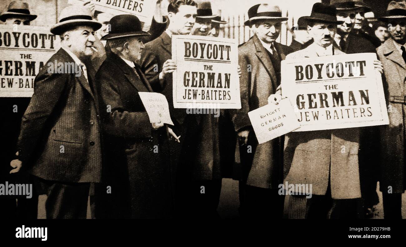 1933  -Worldwide protests took place as here in Hyde Park, London against Hitler's  campaign against the Jews. Jewish protesters  gathered on the  26th of  March, 1933 carrying  placards protesting against anti-semitism in Germany and calling for a boycott of German goods following Nazi organised violence against Jews and their synagogues, property & businesses in Germany. Posters nearby carried similar messages and claimed that the boycott was the moral substitute for war. Stock Photo