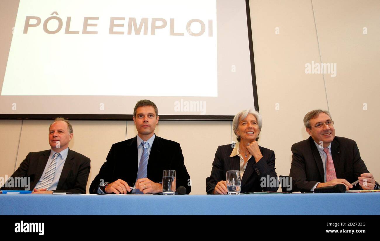 Christian Charpy (L), new "Pole Emploi" representative, French Employment  junior Minister Laurent Wauquiez (2nd L), France's Economy Minister  Christine Lagarde (2nd R), and Dominique-Jean Chertier, President of the  new "Pole Emploi", attend