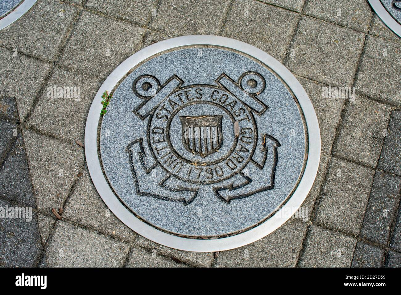 WILDWOOD, NEW JERSEY - September 16, 2020: A Circular Symbol Representing The US Coast Guard on the Ground. Stock Photo
