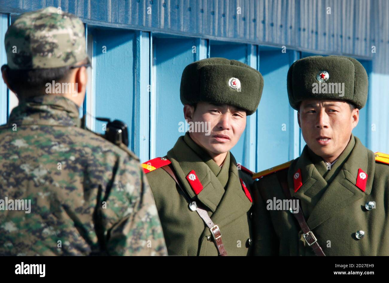 North Korean Soldiers Stand Guard As A U S Soldier L Keeps Watch While Canada S Prime Minister Stephen Harper Not Pictured Visits The Truce Village Of Panmunjom In The Demilitarized Zone Separating North