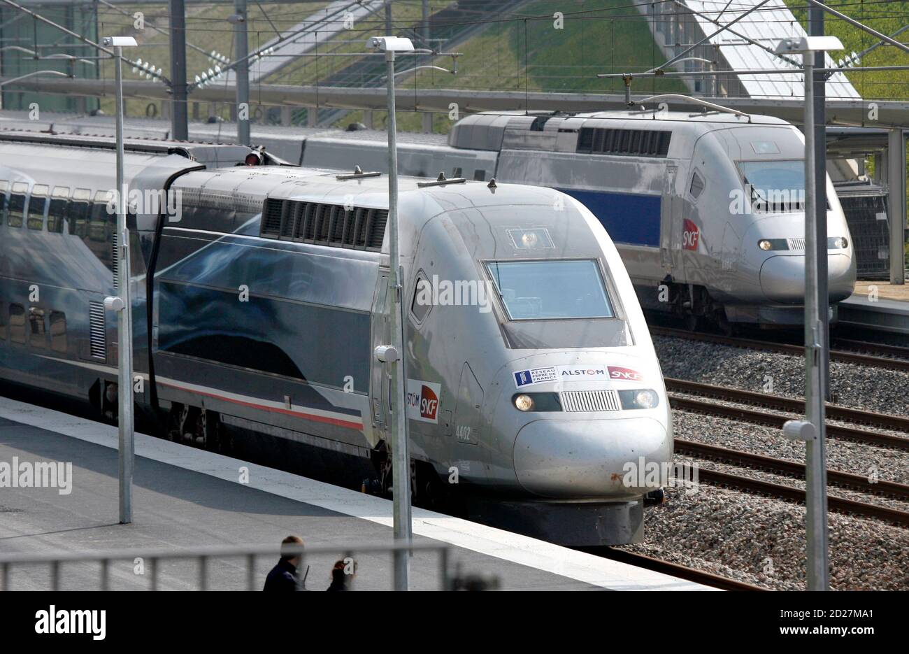 The special V150 French TGV high-speed train (L) arrives at Bezannes after  setting a world speed record at 574.8 km (357 miles) per hour in France's  Champagne region at Bezannes April 3,