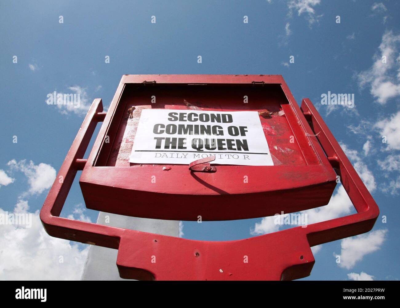 A newspaper for the Ugandan Daily Monitor with a headline the visit of Britain's Queen Elizabeth's visit is displayed in central Kampala November 22, 2007. The queen is due to