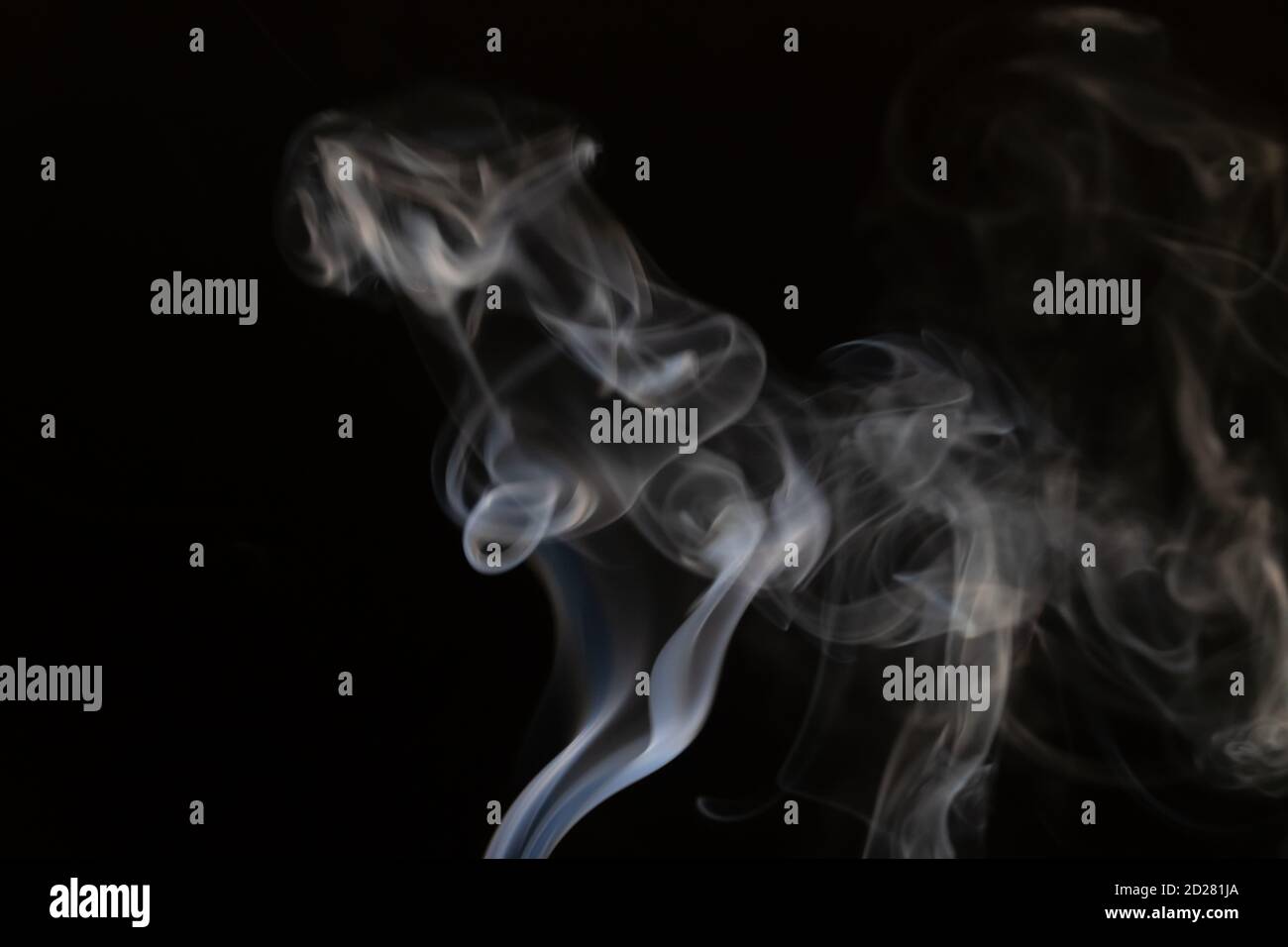 Abstract smoke background with copy space on black background. Blue ...
