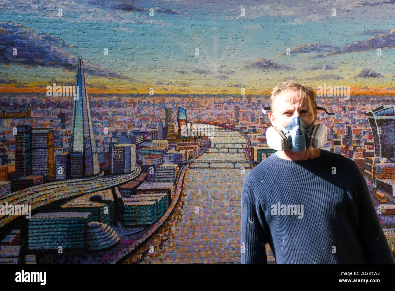 London cityscape mural by Jimmy C an artist supported by Network Rail. The piece emphasises the life, light and energy of London. This mural can be seen at Blackfriars station near the Thames. Stock Photo