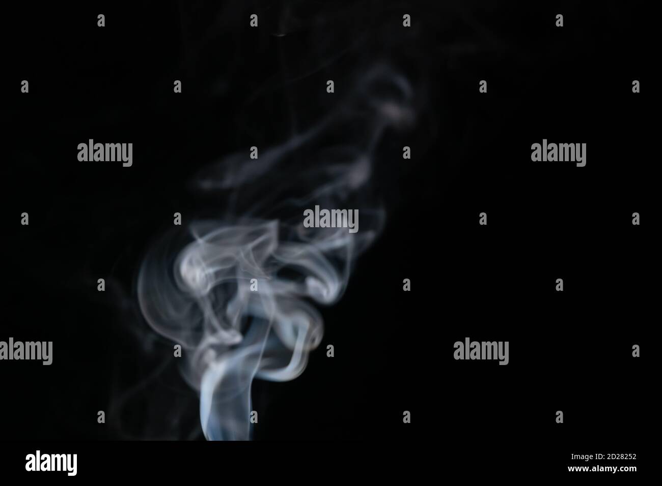 Abstract smoke background with copy space on black background. Blue ...