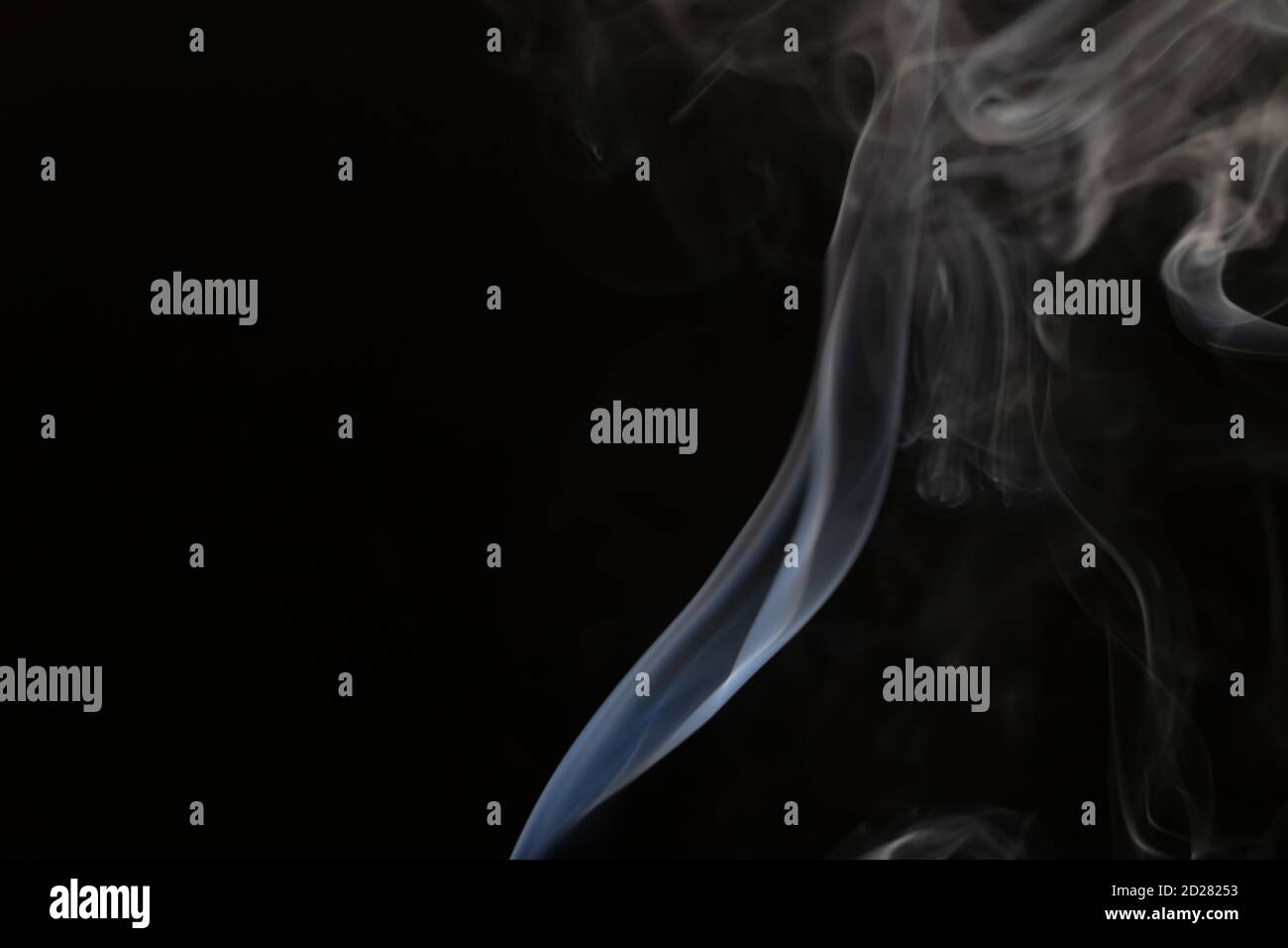 Abstract smoke background with copy space on black background. Blue ...
