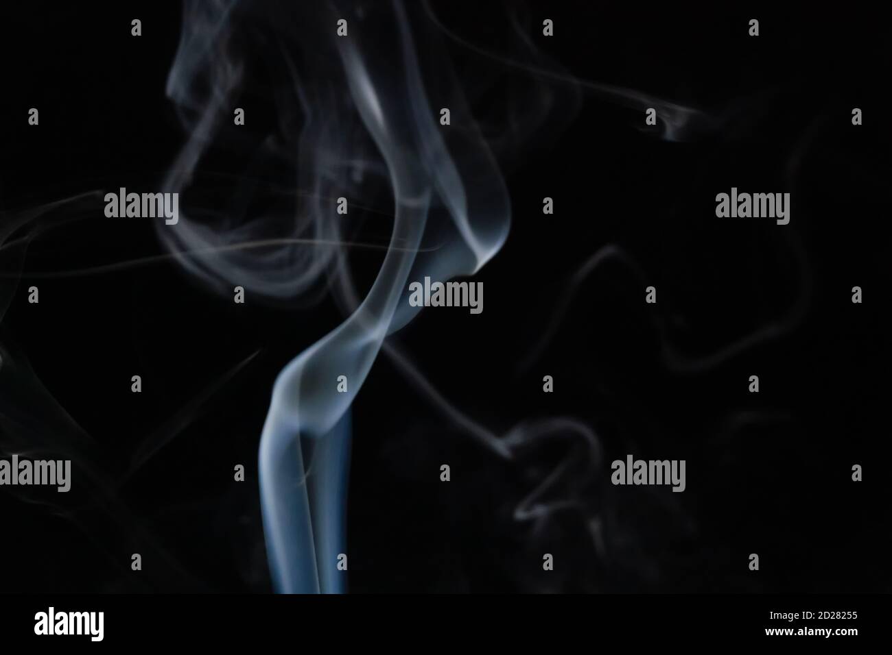 Abstract smoke background with copy space on black background. Blue ...