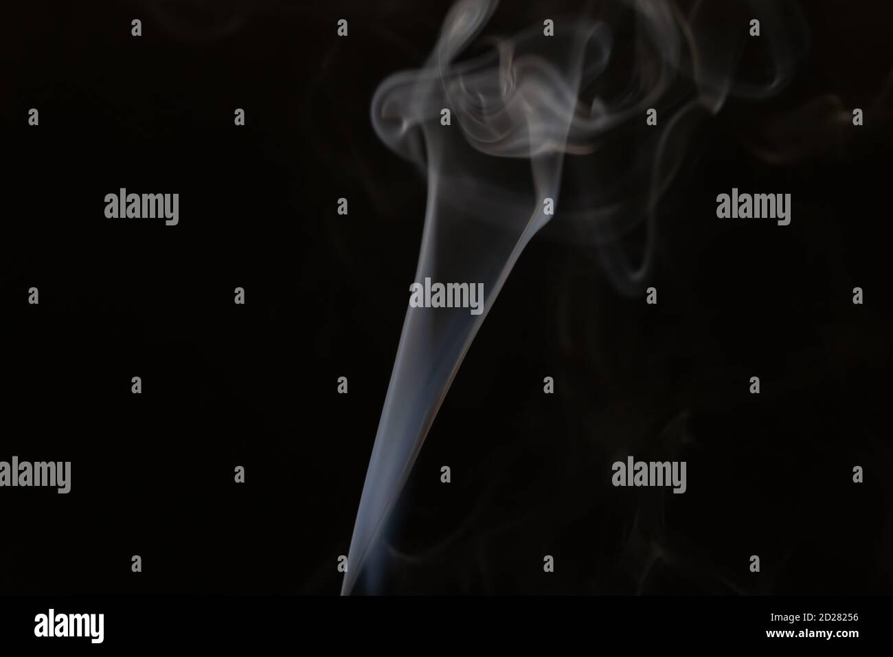 Abstract smoke background with copy space on black background. Blue ...