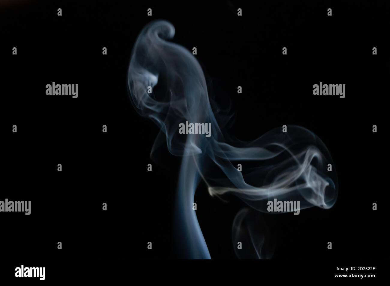 Abstract smoke background with copy space on black background. Blue ...