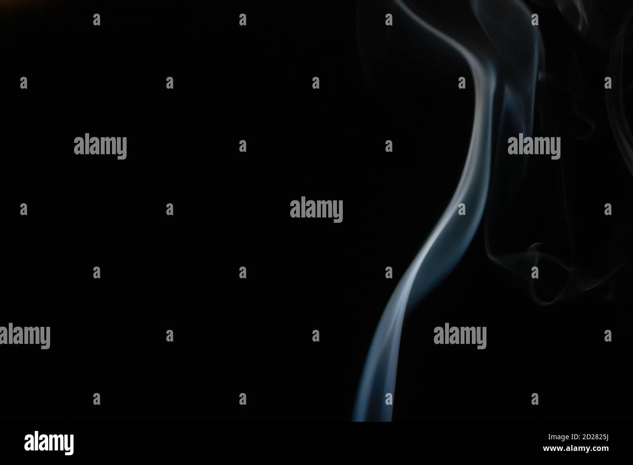 Abstract smoke background with copy space on black background. Blue ...
