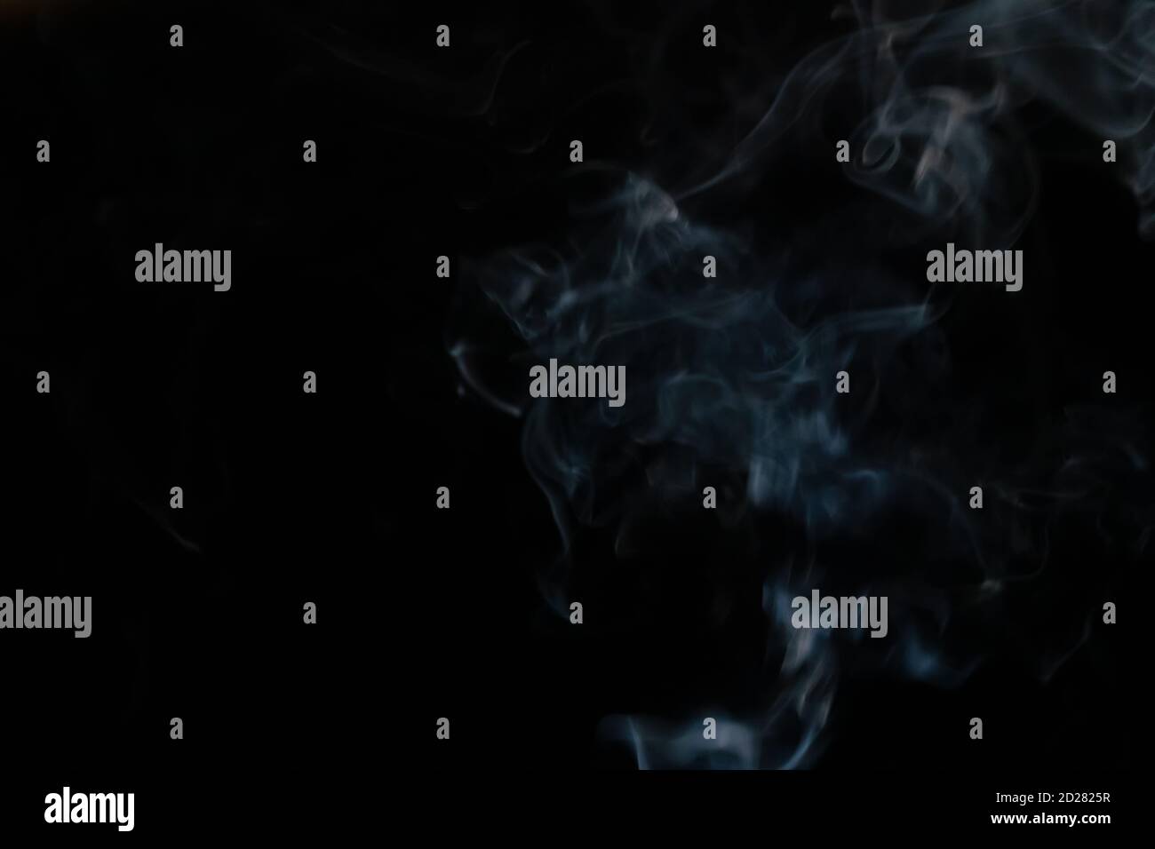Abstract smoke background with copy space on black background. Blue ...