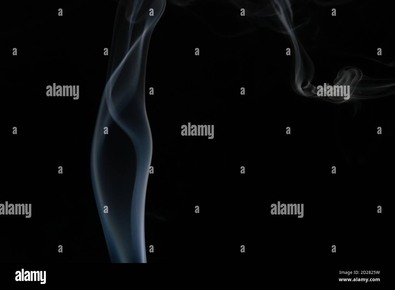 Abstract smoke background with copy space on black background. Blue ...