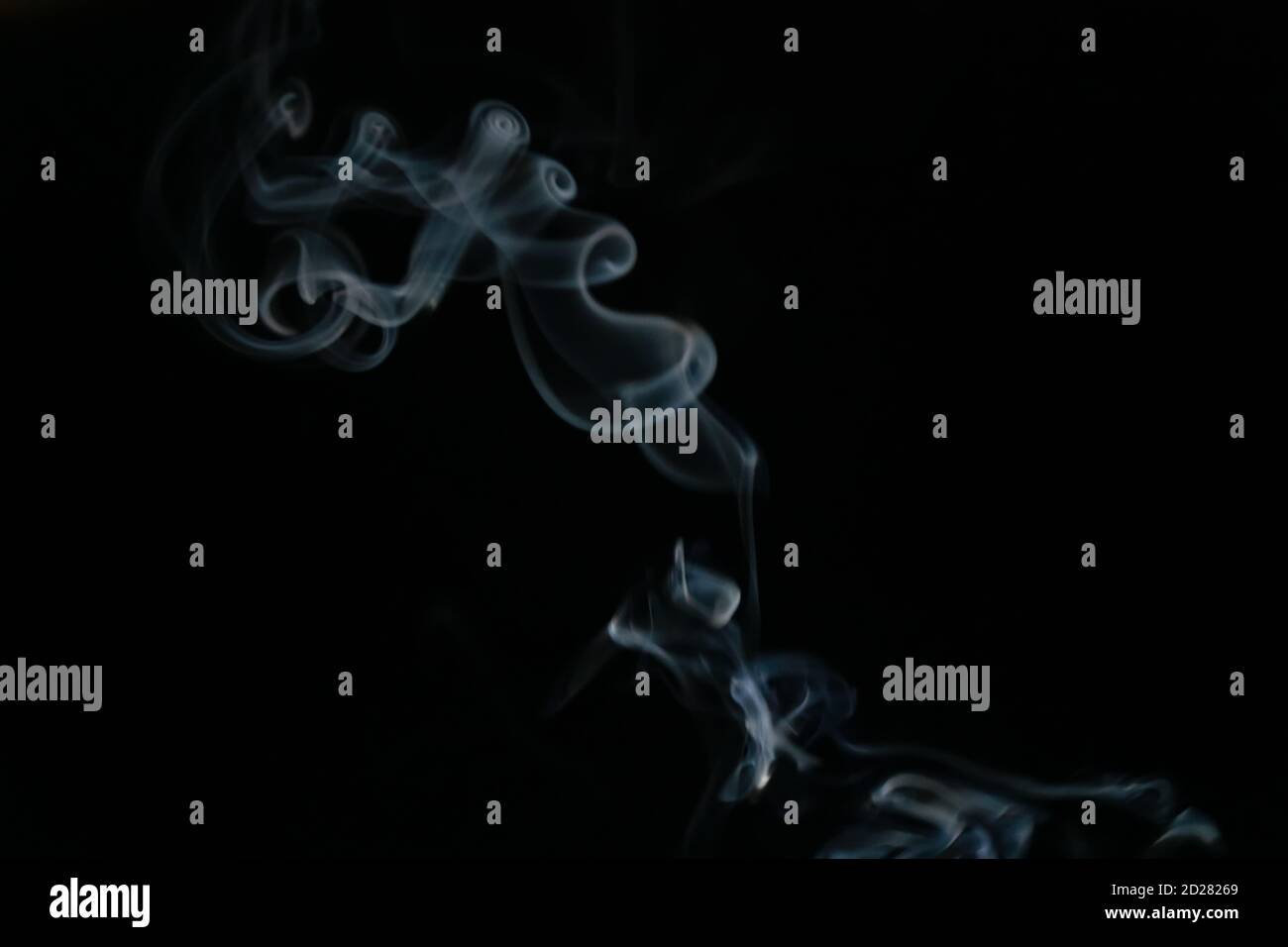 Abstract smoke background with copy space on black background. Blue ...