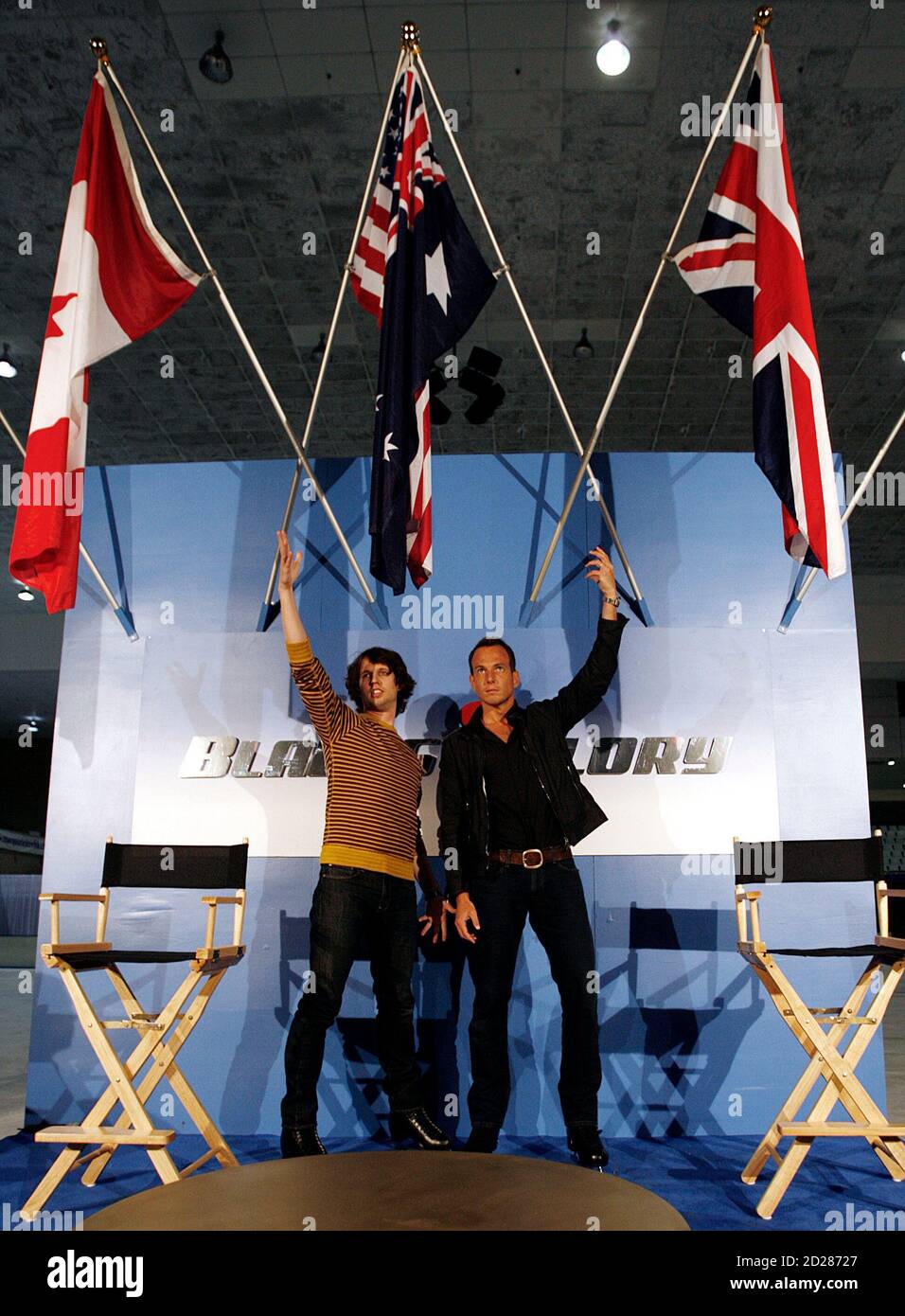 Actors Jon Heder (L) and Will Arnett arrive at a news conference at an ice skating rink to promote their film "Blades of Glory" in Sydney June 6, 2007.         REUTERS/Tim Wimborne     (AUSTRALIA) Stock Photo