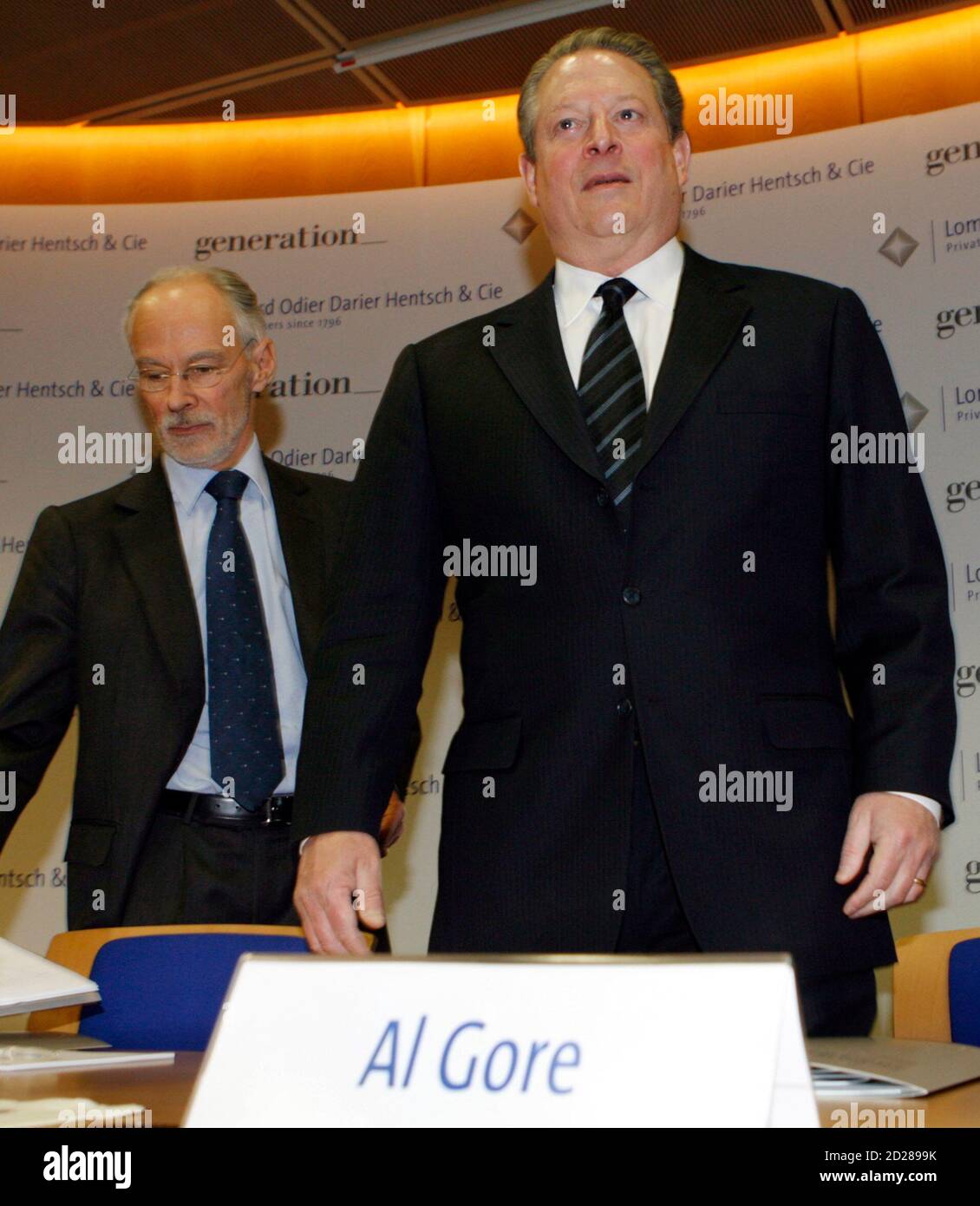 Al Gore (R) Nobel Peace Prize winner and Chairman of Generation Investment Management and Thierry Lombard, Senior Partner LODH arrive for a news conference with Lombard Odier Darier Hentsch (LODH) Private Bank at Cointrin airport in Geneva March 11, 2008. LODH and Generation Investment Management have decided to join forces to promote sustainable investment. REUTERS/Denis Balibouse   (SWITZERLAND) Stock Photo