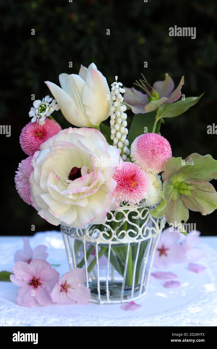 romantic bouquet of white and pink spring flowers in vintage vase Stock Photo