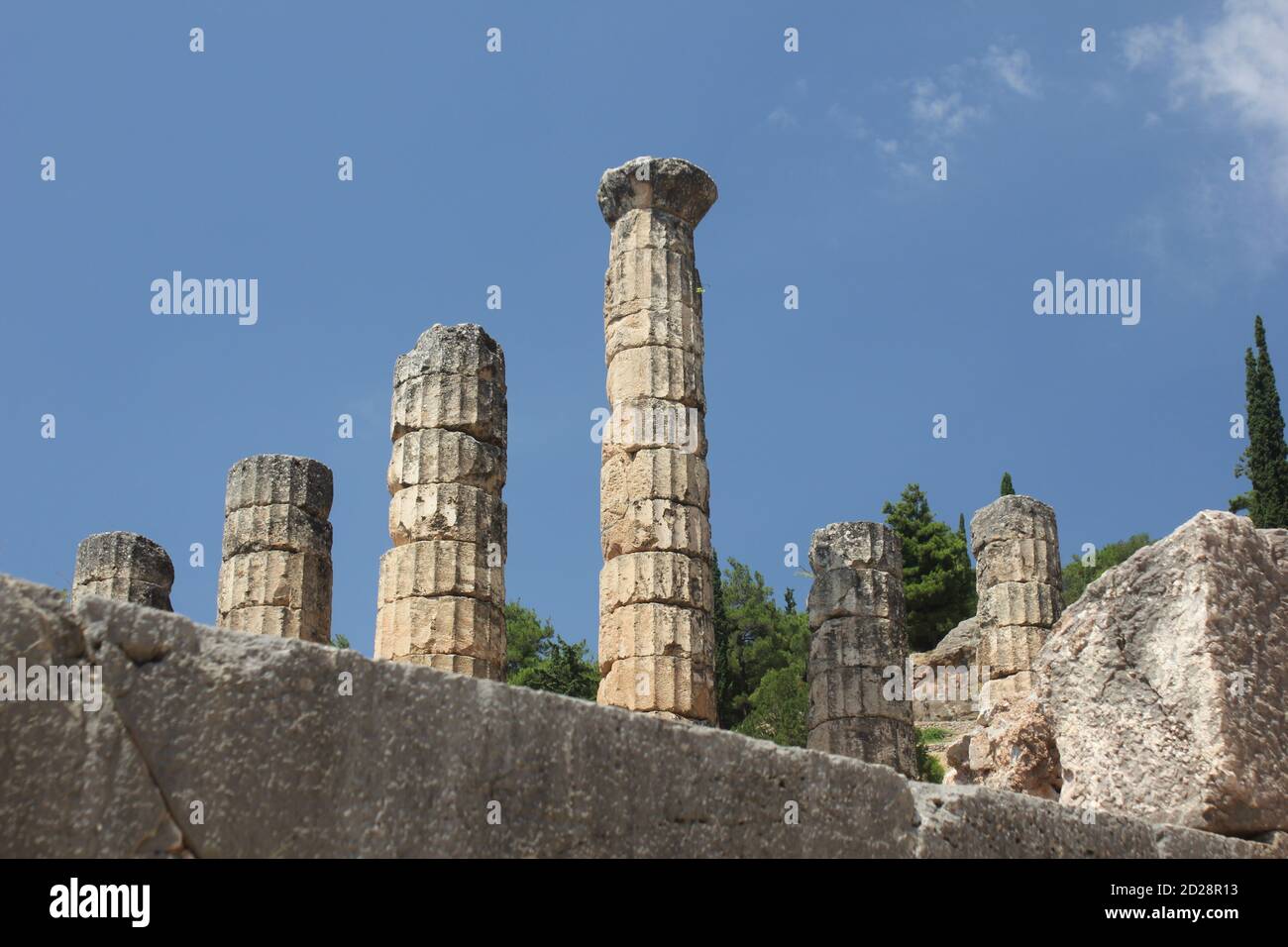 Ruins of the ancient temple of Apollo at Delphi in Greece Stock Photo ...