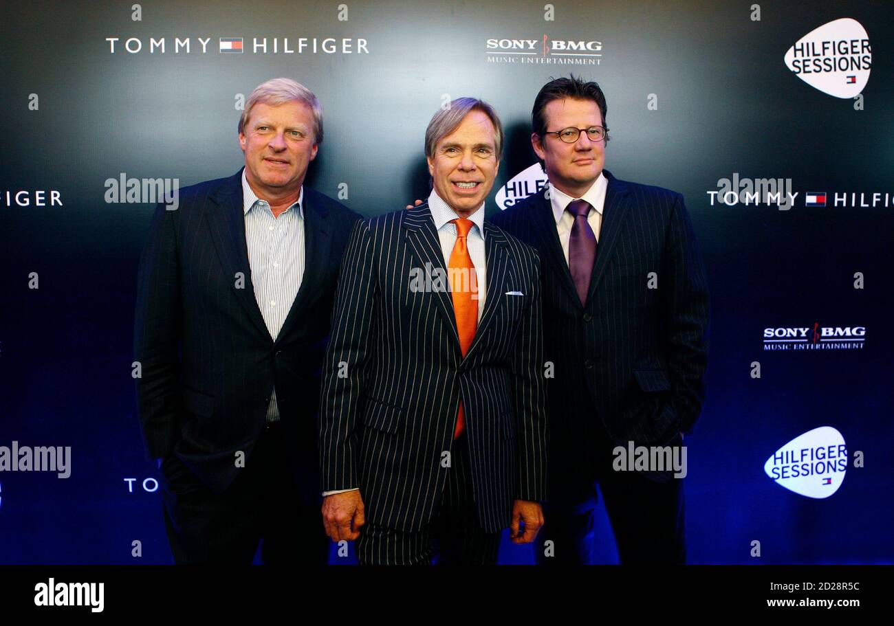 Tommy Hilfiger Group's CEO Fred Gehring (L), designer Tommy Hilfiger (C)  and Sony BMG Europe's head Maarten Steinkamp pose for photographers during  the global launch of TommyTV in central London April 16,