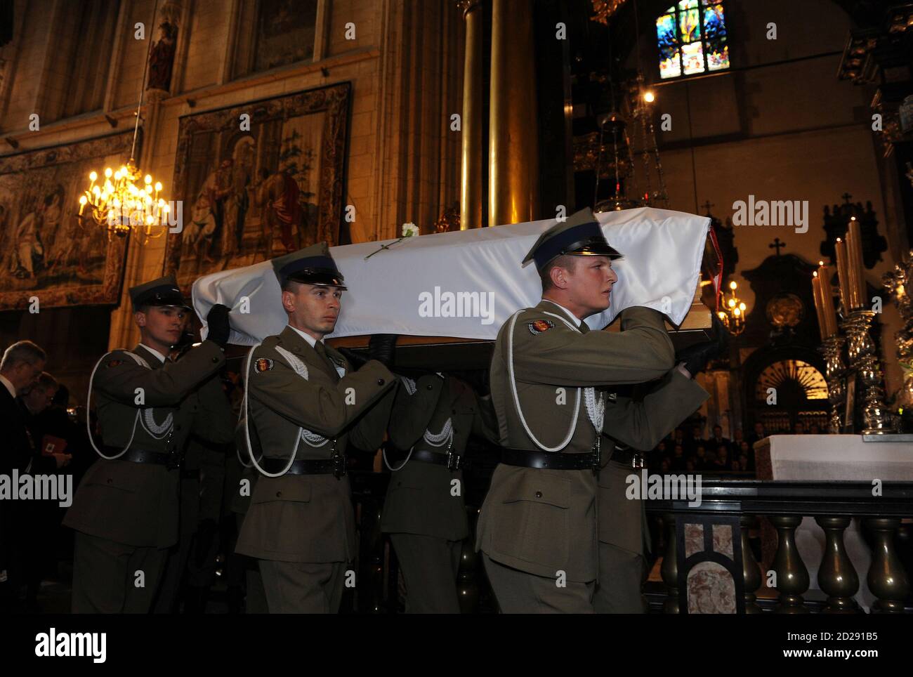 Polish soldiers carry the coffin holding the body of Polish first lady  Maria Kaczynska during a funeral procession in Wawel Cathedral in Krakow,  April 18, 2010. Polish and foreign leaders attended a