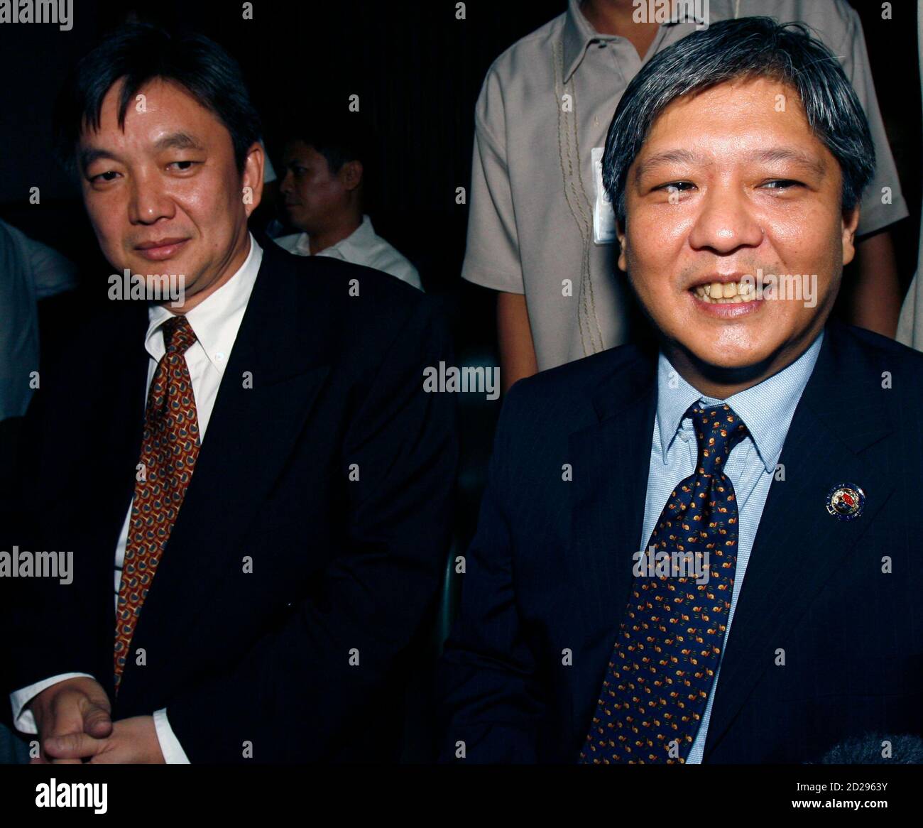 Ferdinand Bongbong Marcos Jr R A Philippine Congressman And Son Of Late Dictator Ferdinand Marcos Sits With His Lawyer Joseph Taddy Before The Start Of A Hearing At The Anti Graft Court In