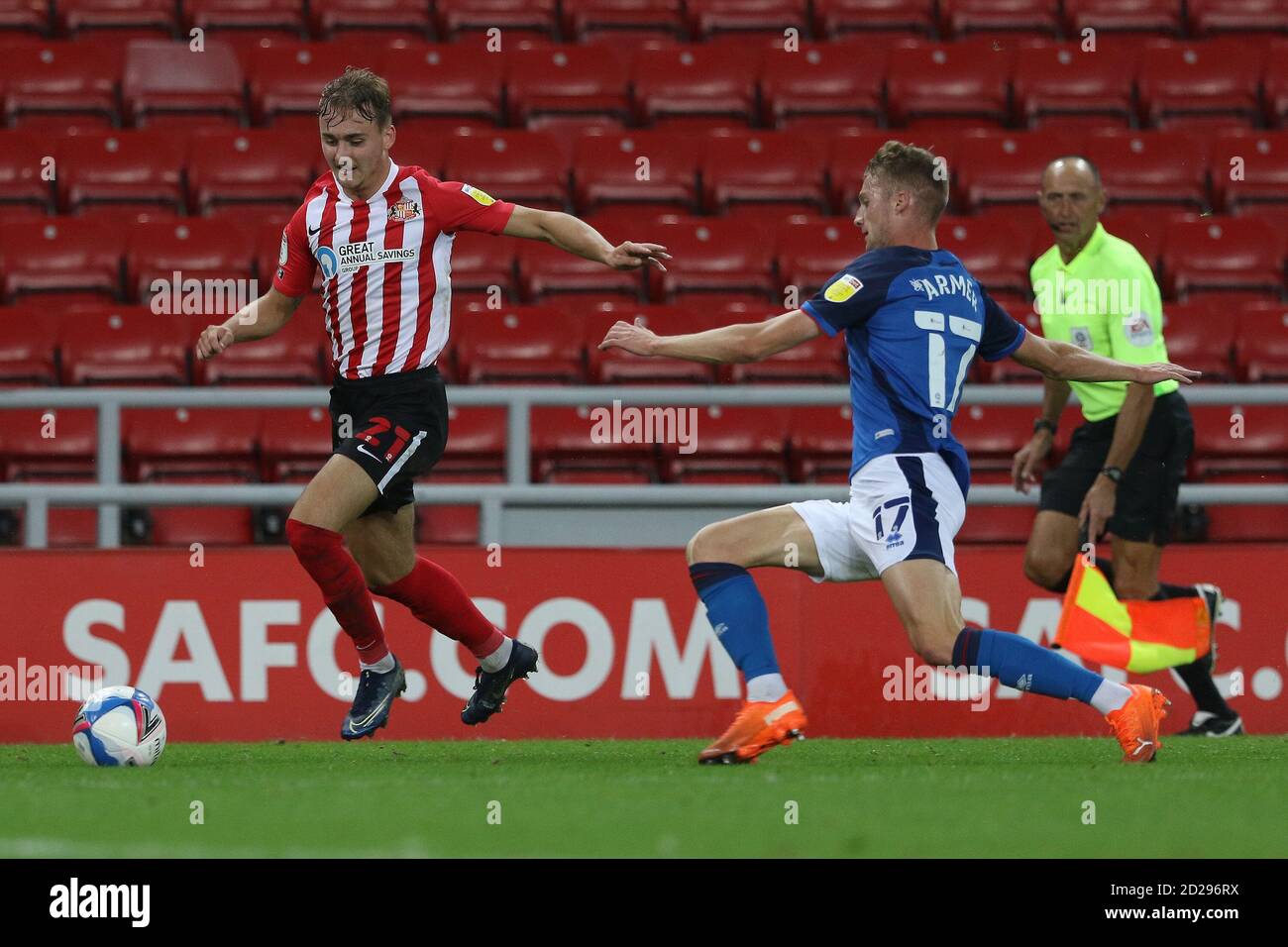 Sunderland, UK. 6th October, 2020. Jack Diamond of Sunderland is challenged by Jack Armer of Carlisle United during the EFL Trophy match between Sunderland and Carlisle United at the Stadium Of Light, Sunderland on Tuesday 6th October 2020. (Credit: Robert Smith | MI News) Credit: MI News & Sport /Alamy Live News Stock Photo