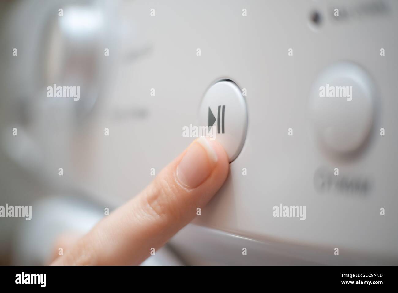 Start button on washing machine hires stock photography and images Alamy