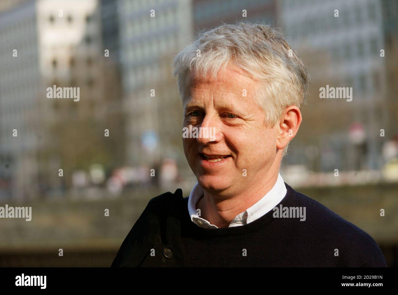 Director Richard Curtis leaves a photo call to promote his new movie "Radio  Rock Revolution" in Berlin April 7, 2009. REUTERS/Hannibal Hanschke  (GERMANY ENTERTAINMENT Stock Photo - Alamy